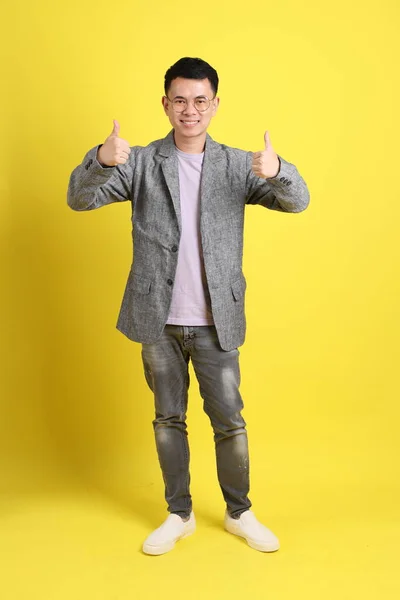 Asian Lgbtq Man Grey Blazer Standing Yellow Background — Stok Foto