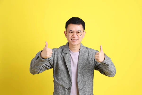 Asian Lgbtq Man Grey Blazer Standing Yellow Background — Stockfoto