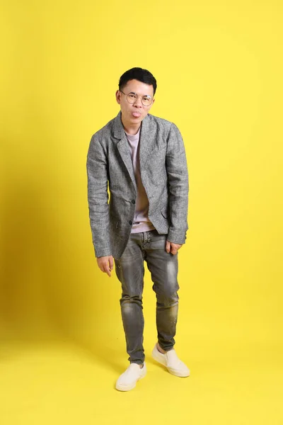 Asian Lgbtq Man Grey Blazer Standing Yellow Background — Fotografia de Stock