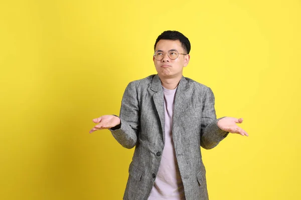 Asian Lgbtq Man Grey Blazer Standing Yellow Background — Stok fotoğraf