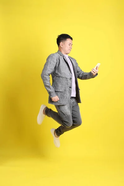 Asian Lgbtq Man Grey Blazer Standing Yellow Background — Foto de Stock