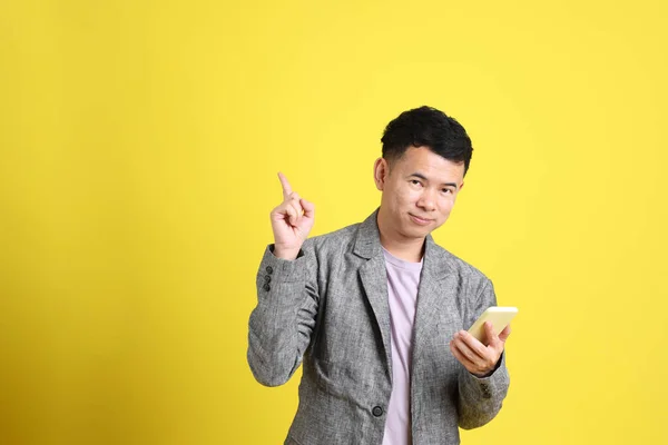 Asian Lgbtq Man Grey Blazer Standing Yellow Background — Stockfoto