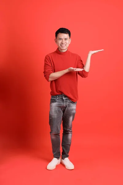Asian Lgbtq Man Red Shirt Standing Orange Background — 图库照片