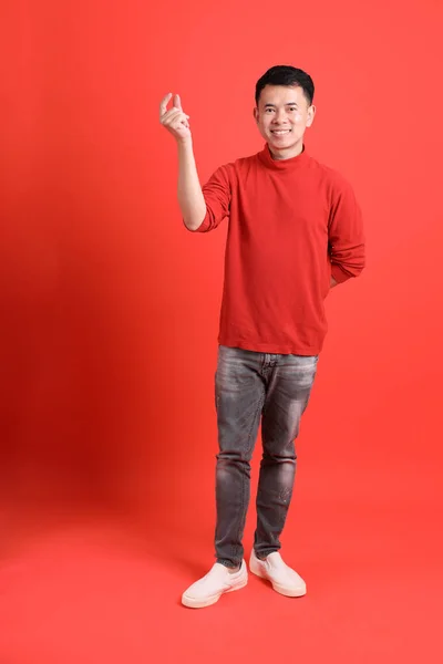 Asian Lgbtq Man Red Shirt Standing Orange Background — 图库照片