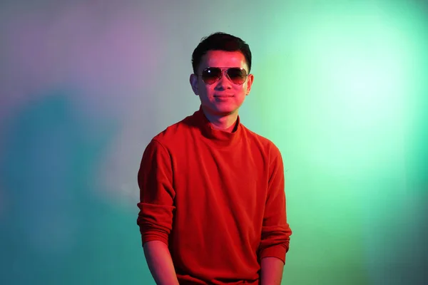 Cool Adult Asian Man Blue Background Color Gel Lighting — ストック写真