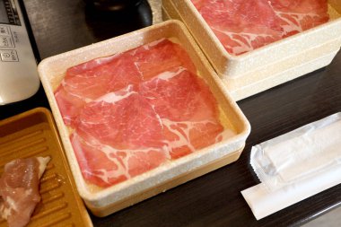 The raw sliced pork menu for cook in the Shabu menu.