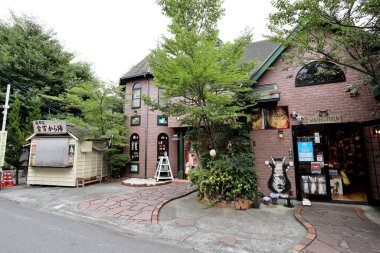 Oita, Japan - July 21, 2022: The street view of small town in Oita, Japan named Yufuin.