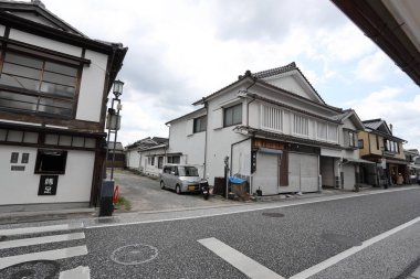 Beppu, Japan - July 22, 2022: Mamedamachi Shopping Street is a walking path filled with ancient shops selling products from art and craft.