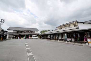 Beppu, Japan - July 22, 2022: Mamedamachi Shopping Street is a walking path filled with ancient shops selling products from art and craft.