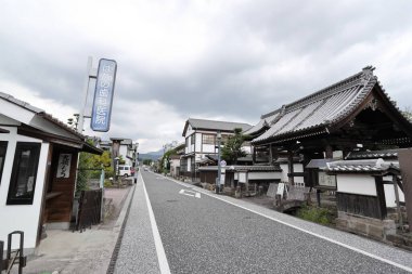Beppu, Japan - July 22, 2022: Mamedamachi Shopping Street is a walking path filled with ancient shops selling products from art and craft.
