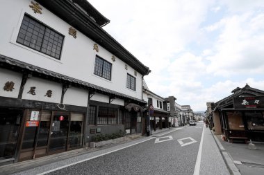 Beppu, Japan - July 22, 2022: Mamedamachi Shopping Street is a walking path filled with ancient shops selling products from art and craft.
