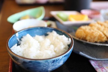 The crispy deep fried pork named donkatsu served with Japanese rice and Miso soup.