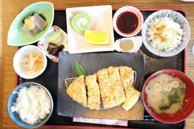 The crispy deep fried pork named donkatsu served with Japanese rice and Miso soup.