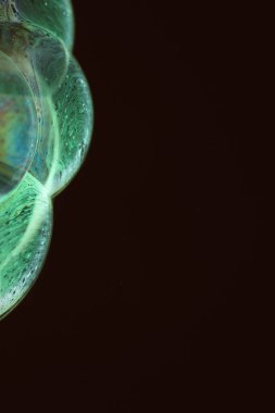 The abstact element on the soap bubble with the dark background.