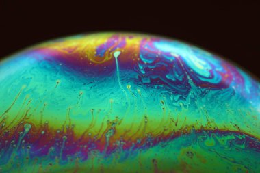 The abstact element on the soap bubble with the dark background.