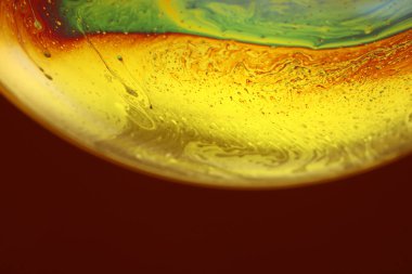 The abstact element on the soap bubble with the dark background.