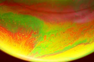 The abstact element on the soap bubble with the dark background.
