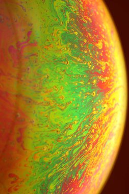 The abstact element on the soap bubble with the dark background.