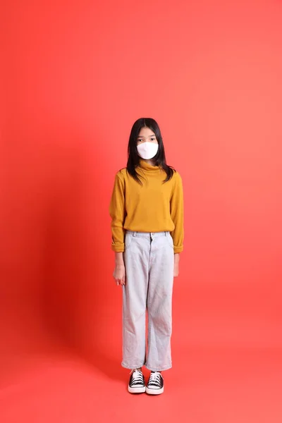 Young Asian Girl Yellow Shirt Orange Background — Stock Photo, Image