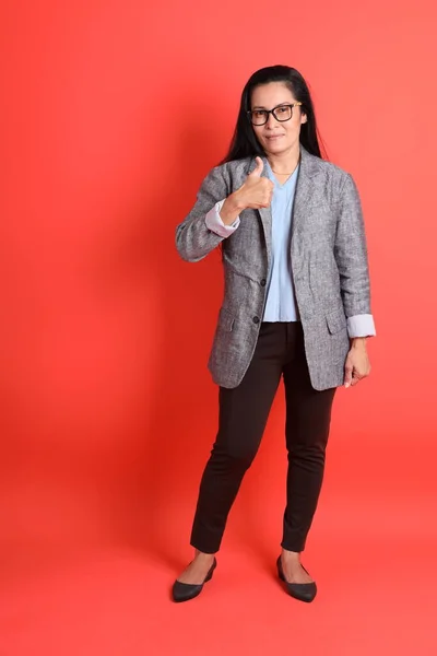 Asian Senior Businesswoman Standing Orange Background — Stock Photo, Image