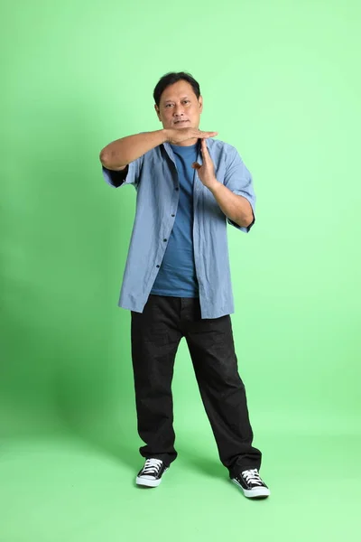 40S Adult Overweight Asian Man Standing Green Background — Stock Photo, Image