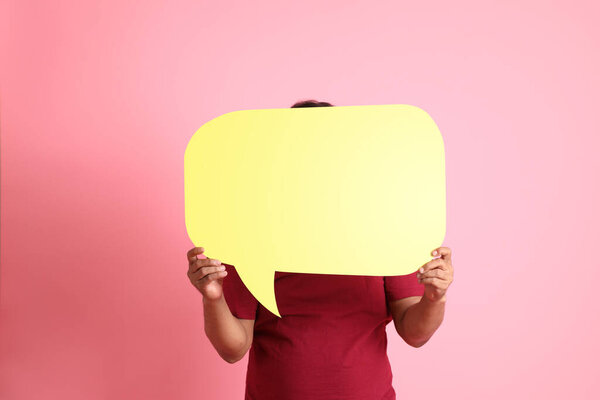 The 40s adult overweight Asian man standing on the pink background.