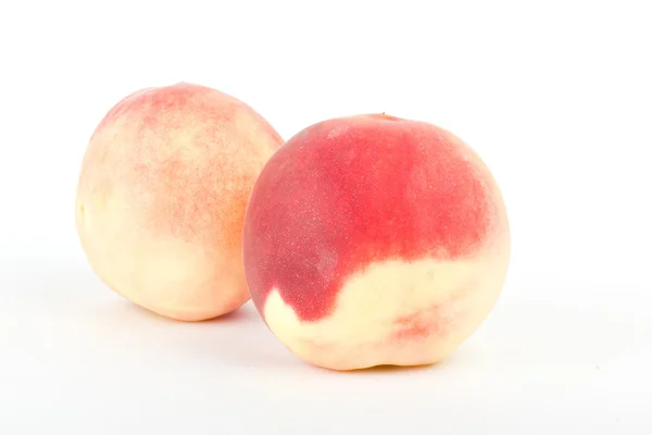 Fresh peach fruits on white — Stock Photo, Image