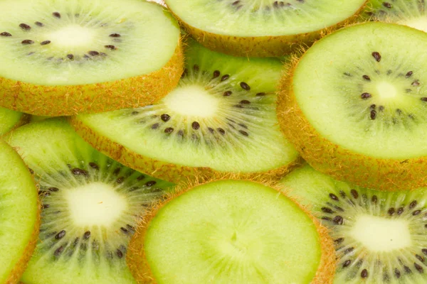Fresh ripe kiwi slices background — Stock Photo, Image