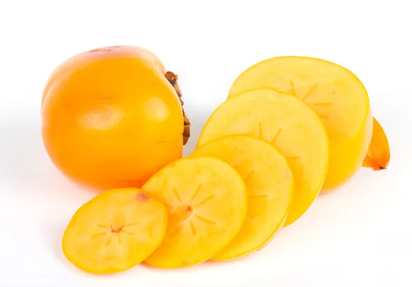 新鲜多汁柿子与白色的片 — 图库照片