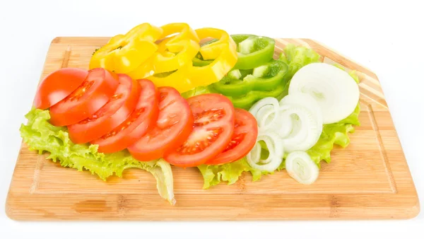 Fresh slices of pepper, onion and tomatoes on white — Stock Photo, Image