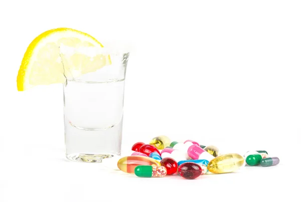 Alcohol and drugs on white background — Stock Photo, Image