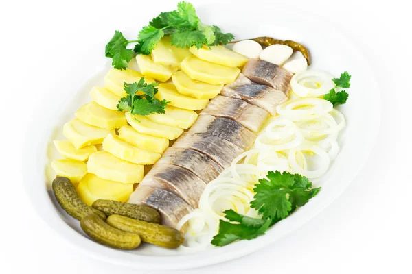 Portion of herring fish fillets with potato and onion — Stock Photo, Image