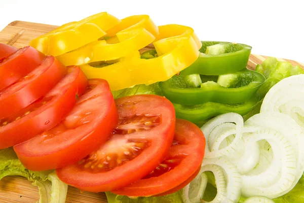 Frisches Gemüse in Scheiben geschnitten Hintergrund — Stockfoto
