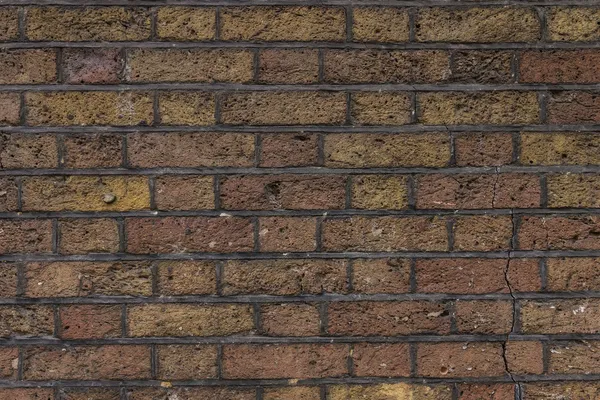 Backsteinmauer Hintergrund — Stockfoto