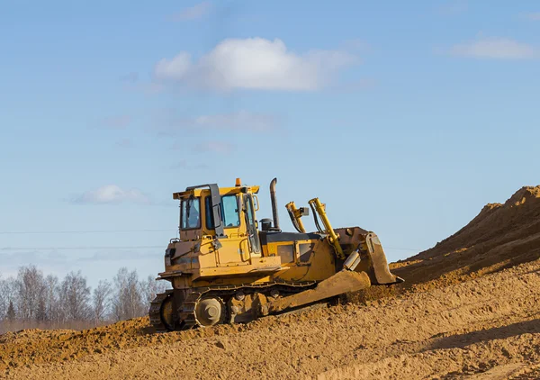 Yellow bulldozer at Work in forest — Stock Photo, Image