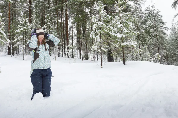 Woman outdoors at winter forest — Stock Photo, Image