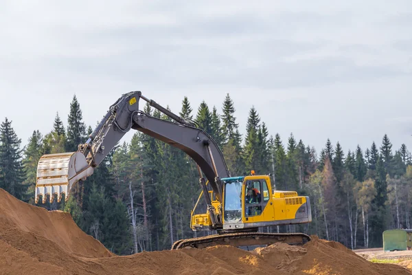 Yellow Construction Excavator at Work