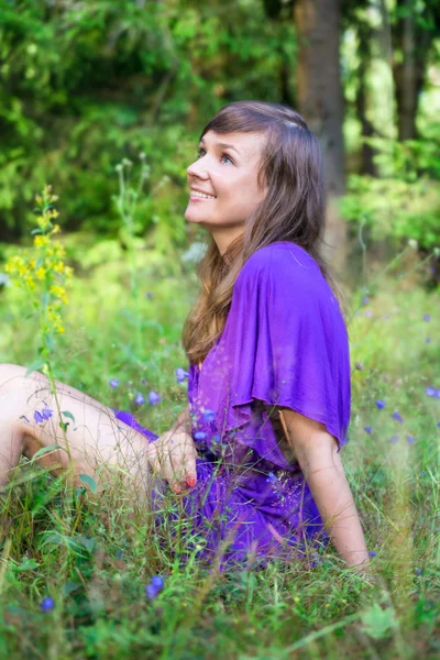 Pretty woman on a field — Stock Photo, Image