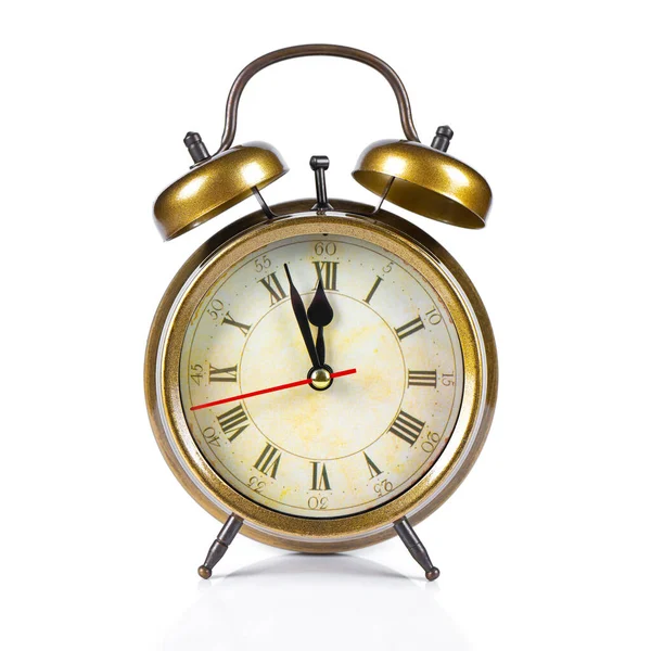 Bronze vintage alarm clock isolated on white background Royalty Free Stock Images