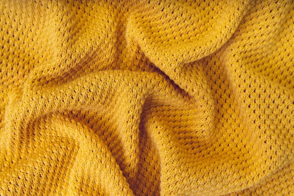 Amarelo crumpled tricô lã textura fundo. — Fotografia de Stock