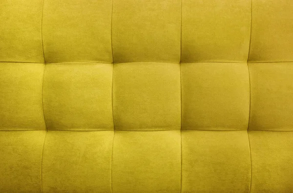 Yellow suede leather background, classic checkered pattern for furniture, wall, headboard