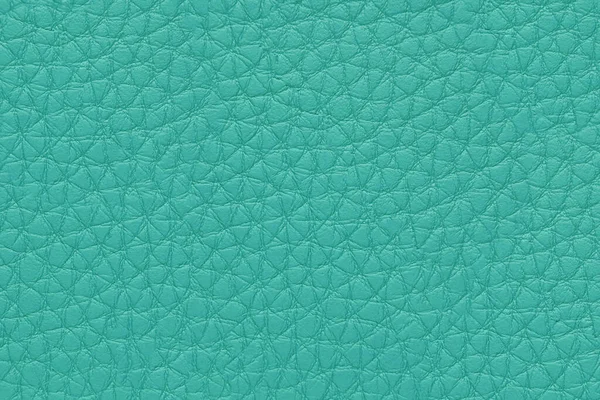 Natural, artificial turquoise leather texture background. Material for sport items, clothes, furnitre and interior design. ecological friendly leatherette.