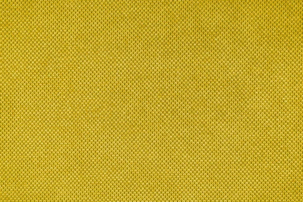 Texture background of velours yellow fabric. Fabric texture of upholstery furniture textile material, design interior, wall decor. Fabric texture close up, backdrop, wallpaper.