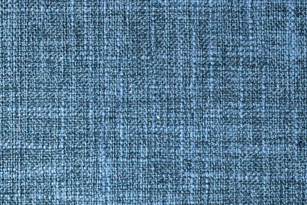 自然な青粗織生地や布のクローズアップテクスチャ 天然の綿やリネンの繊維素材の生地の質感 青いキャンバスの背景 壁の装飾ファブリック — ストック写真