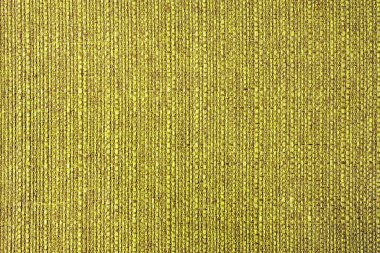 Doğal sarı kabarık kumaş ya da kumaşın yakın çekim dokusu. Doğal pamuk veya keten kumaş dokusu. Mavi tuval arka plan. Döşeme, mobilya ve duvarlar için dekoratif kumaş