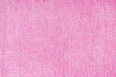 Doğal pembe kabuklu kumaş ya da kumaşın yakın çekim dokusu. Doğal pamuk veya keten kumaş dokusu. Mavi tuval arka plan. Döşeme, mobilya ve duvarlar için dekoratif kumaş