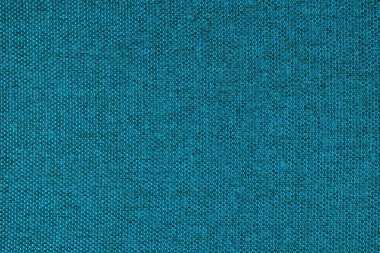 Doğal turkuaz kabuklu kumaş ya da kumaşın yakın çekim dokusu. Doğal pamuk veya keten kumaş dokusu. Mavi tuval arka plan. Döşeme, mobilya ve duvarlar için dekoratif kumaş