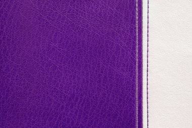Natural, artificial purple and white leather texture background with vertical decorative seam. Material for sport items, clothes, furnitre and interior design. ecological friendly leatherette.