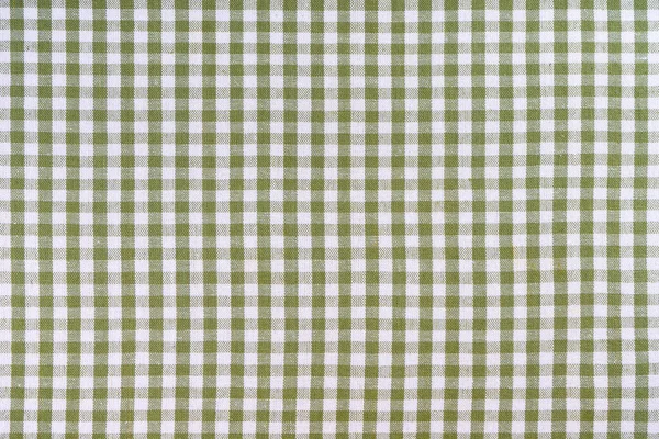 Green classic checkered tablecloth texture, background with copy space. Background texture checkered pattern fabric for cuisine, menu. Food mockup, template, restaurant wallpaper, kitchen backdrop