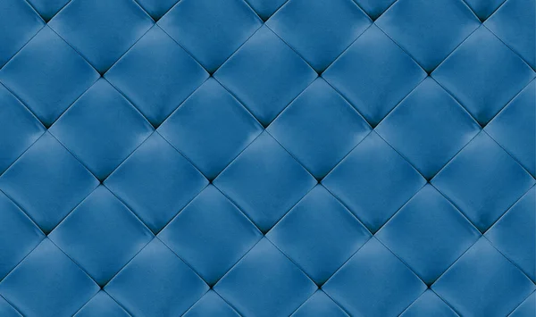 Blue natual leather background for the wall in the room. Interior design, headboards made of artificial leather, leatherette , furniture upholstery. Classic checkered pattern for furniture, headboard